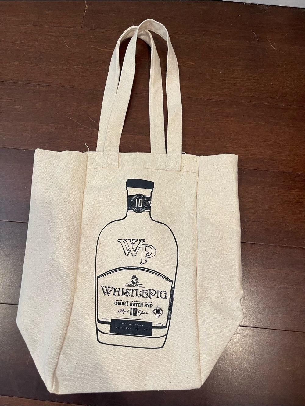 tote bag with whistle pig bourbon label